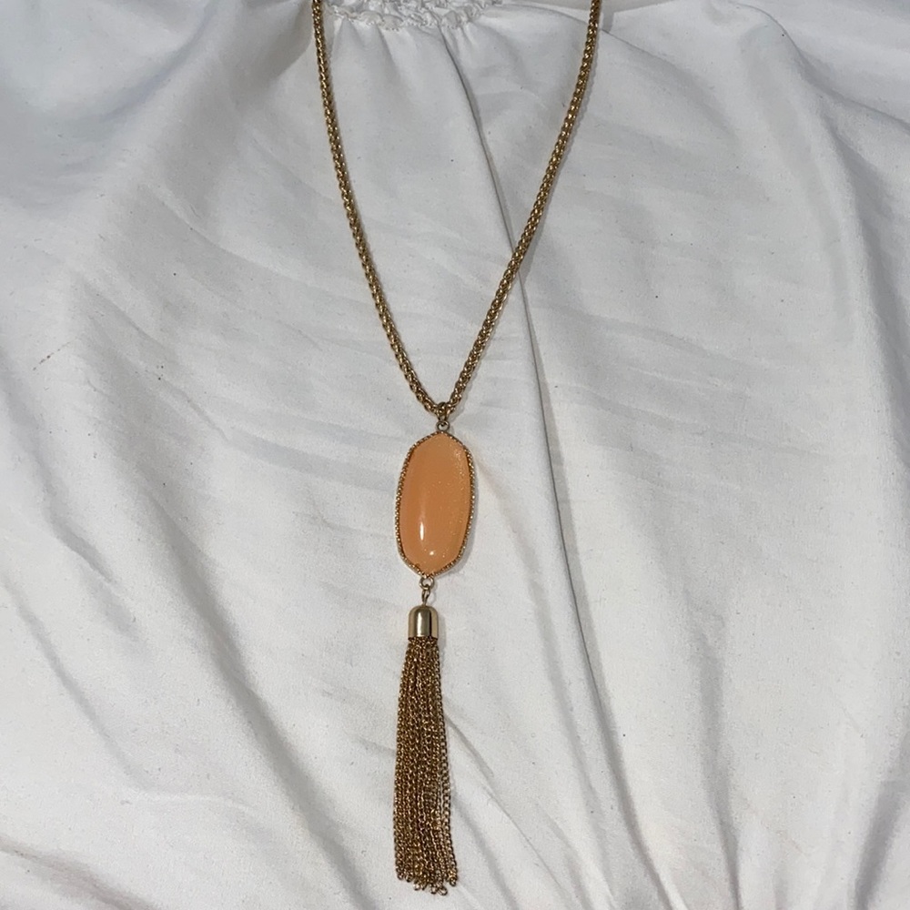Peach and gold colored necklace